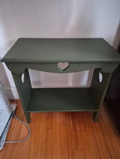 Accent table with heart shaped cutouts, View more