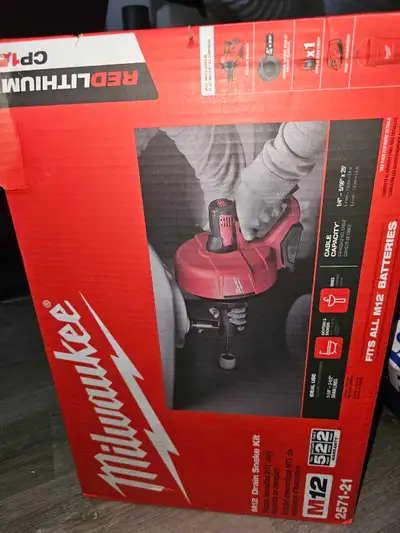 I'm selling a new Milwaukee M12 Drain Snake Kit 2571-21, designed for tackling blockages in sinks, t...