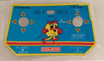 Copyright 1981 Sticker from mini arcade console See photos for condition, complete but corner has te...