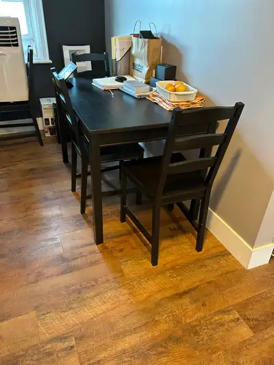 Excellent condition dining table with four chairs everything just like new