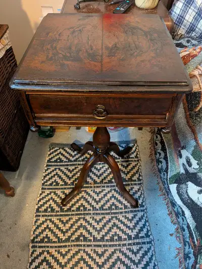 antique table with drawer., View more
