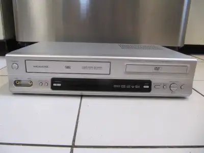Up for sale is a Magnasonic Model DVD820 VHS/DVD/Video CD/CD/MP3 Recorder and Player Combo. Part of...