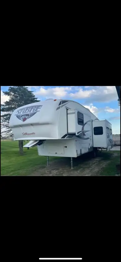 30 ft 24 ft awning Excellent shape, super clean, non smoking. 2 slide outs Fireplace x 2 TV’s New Mi...