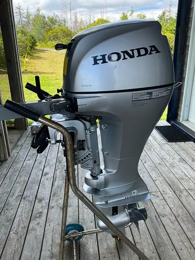 4 year old, less than 25 Hours,9.9 HP Honda 4-stroke
