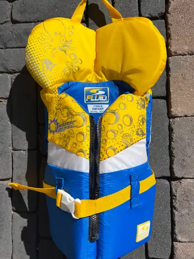 Selling a very lightly used (worn a couple times) Fluid Child's life jacket / Personal Floatation De...