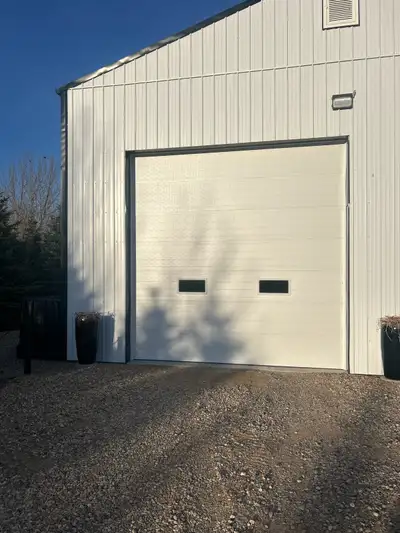 14 & 14 door steel craft , does have very minor hail damage this is doors only call 306 270 1909