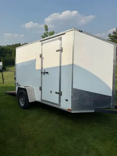 6x10 slanted nose V enclosed trailer. Purchased new in 2016. Aluminum and light weight. Tows easy. L...