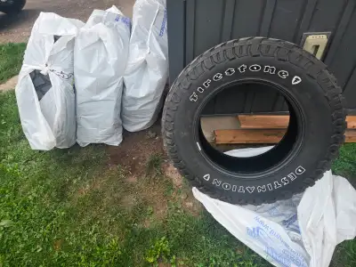 Get ready for any terrain with these used Firestone Destination MT2 tires, sized LT255/75R17, design...