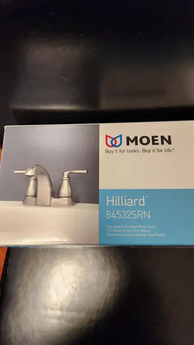 BNIB Moen 2 handle Brushed Nickel faucet with Spot Resist. Matching Push-down drain is also included...