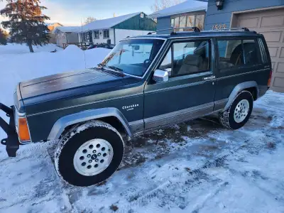 Rare 2 door Laredo 138000 original km rust free came from Okanagan. Extensive work done. Header to t...