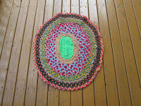 SMALL HAND BRAIDED OVAL RUG
