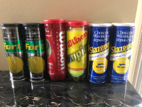 Six Tennis ball cans 