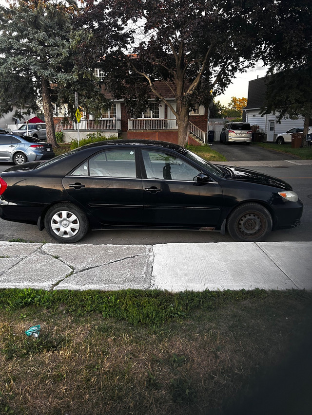 Toyota Camry  dans Autos et camions  à Laval/Rive Nord