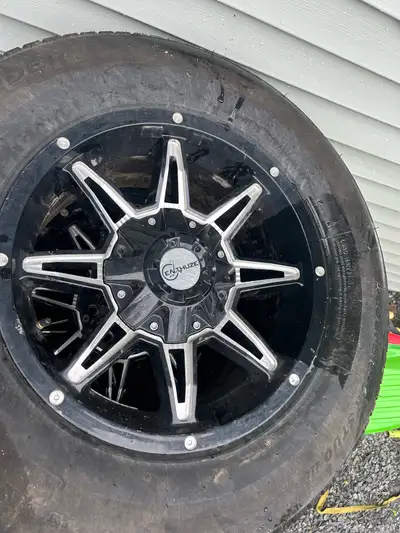 275/56/18 LT winter rated truck tires on nice enthuze aluminum wheels. The wheels are dual bolt patt...
