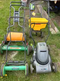 Lawn mowers and seed spreader