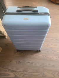 Rolling suitcase with built in charger and lock