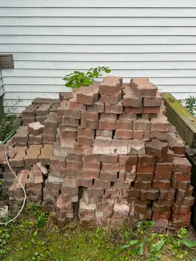 I’m giving away a large quantity of patio bricks along with several long pressure-treated wood beams...