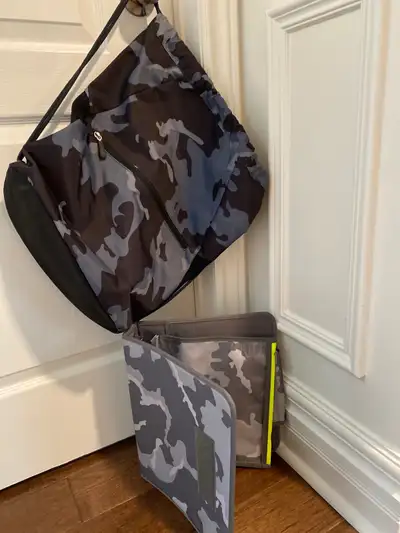 New Pottery Barn Teen string comouflage backpack with front zip. Also includes gently used camouflag...