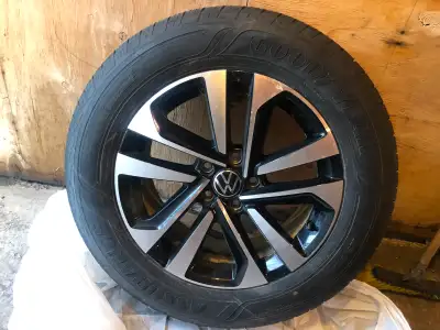 Goodyear tire Install on original OEM VW Rims All Season Good Year Tire. More than 95 % new Size 215...