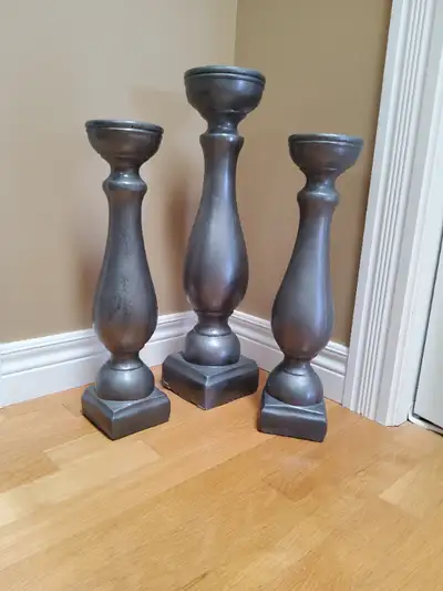 3 ornamental indoor or outdoor (cement) candle stands. In excellent condition - never used outside -...