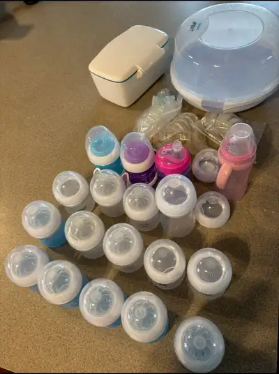 Avent baby bottles and sterilizer, View more