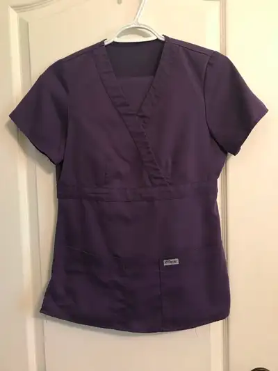 Three pairs of scrubs (xs). Very good condition.