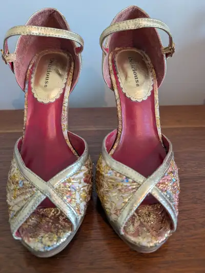 Beautiful gold high heal shoes size 7!, View more
