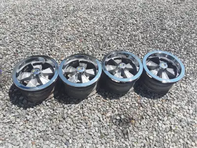 4 aluminum mags with chrome dishes with lug nuts All in fair condition asking 600 or best offer