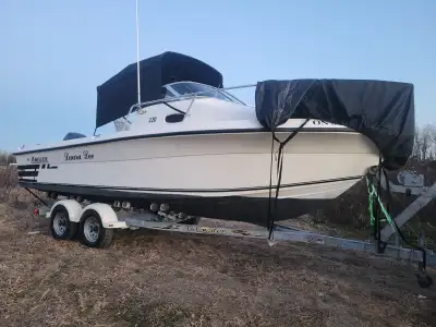 2004 Angler 2200 walkaround, 200 hp yamaha OX66 fuel injection and an evinrude kicker, galvanized du...