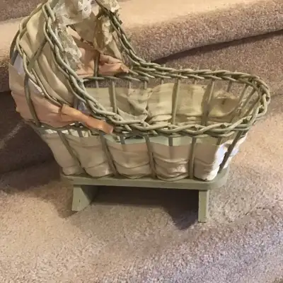 Vintage wicker doll cradle, View more