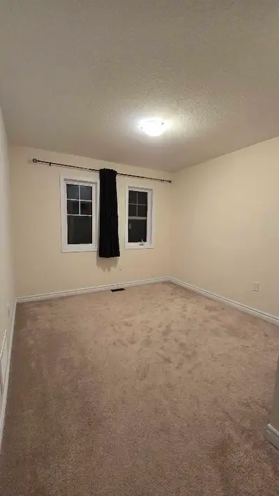 Private bedroom in a 3 bed, 2.5 bath townhouse. Shared kitchen, washroom occasionally shared with gu...