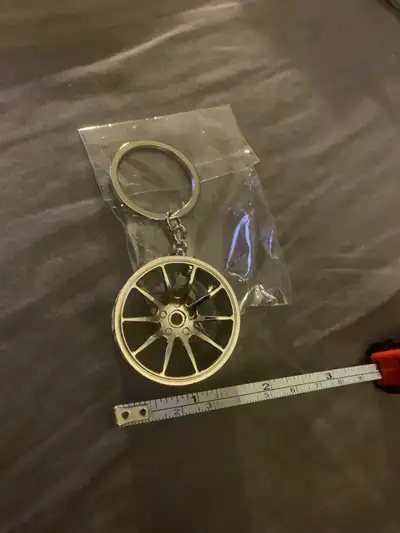 Car rim keychain Brand new in package Check out my ads for other car items