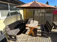 Patio Furniture, three benches, table, and umbrella
