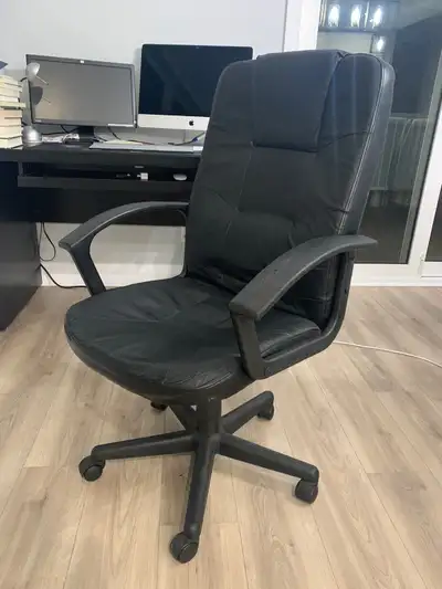 Black Faux Leather chair in good condition