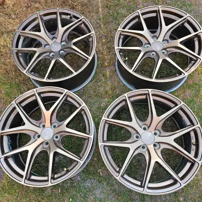 selling four 18 inch Fast FC04 flow form light weight alloy rims for $900. Rims are like new. rims h...