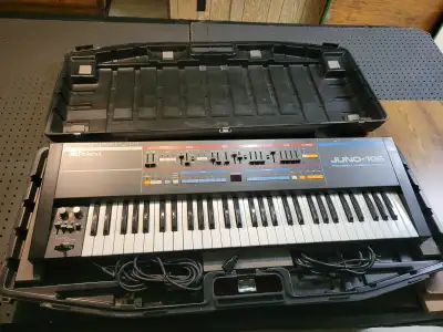 In very good condition. Comes with case. It is a six-voice polyphonic analog synthesizer featuring d...