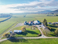 #24FG - 5.24± ACRES WITH TWO HOMES AND MULTIPLE BARNS