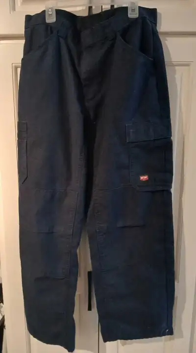 Size 34/30 mens cargo style work pants by Red Kap. Good used condition, no rips or tears. Good for m...