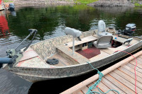 16ft Lund Aluminum Boat, Trailer and 60hp outboard.