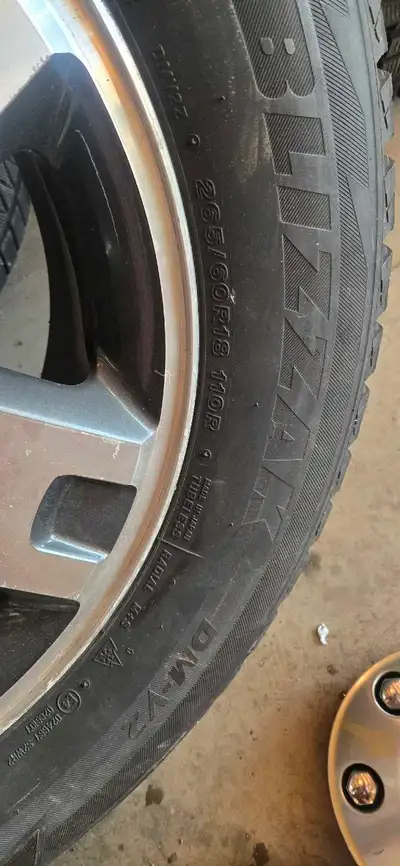 I am selling a set of four F150 6-bolt pattern aluminum rims that are fitted with Bridgestone Blizza...