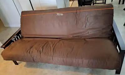 Free double futon. One hinge is damaged but will work as a bed. Good condition otherwise. Pick up ne...