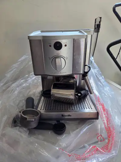 Breville cafe roma, we upgrade to a bigger machine. $40 pick up only