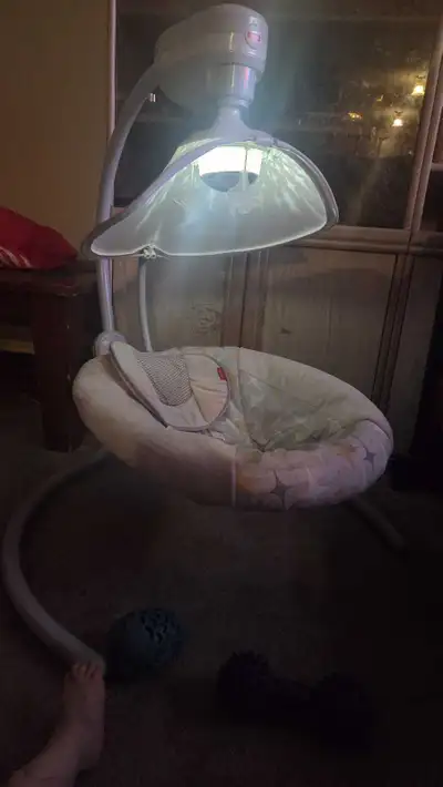 Fully functional. Clean and packed away. Overhead mobile, mirror and lights. Plays music/sounds and...