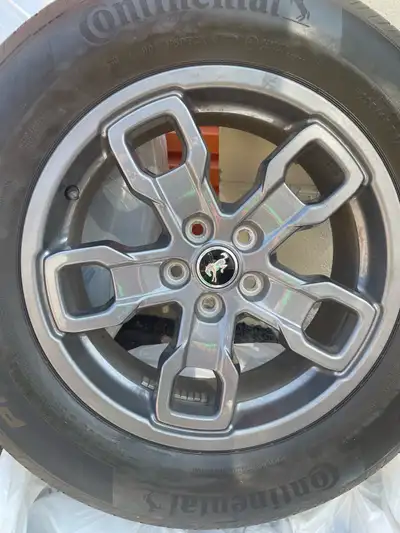 Selling 4 All season Continental tires mounted on 4 Ford Bronco rims. Comes with stock bronco Center...