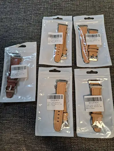 Selling brandnew Fitbit smart watch band replacement color Brown and Apricot in EXCELLENT condition...