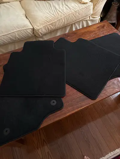 Brand new, NEVER used fabric floor mats for Ford Escape - two front and two rear.