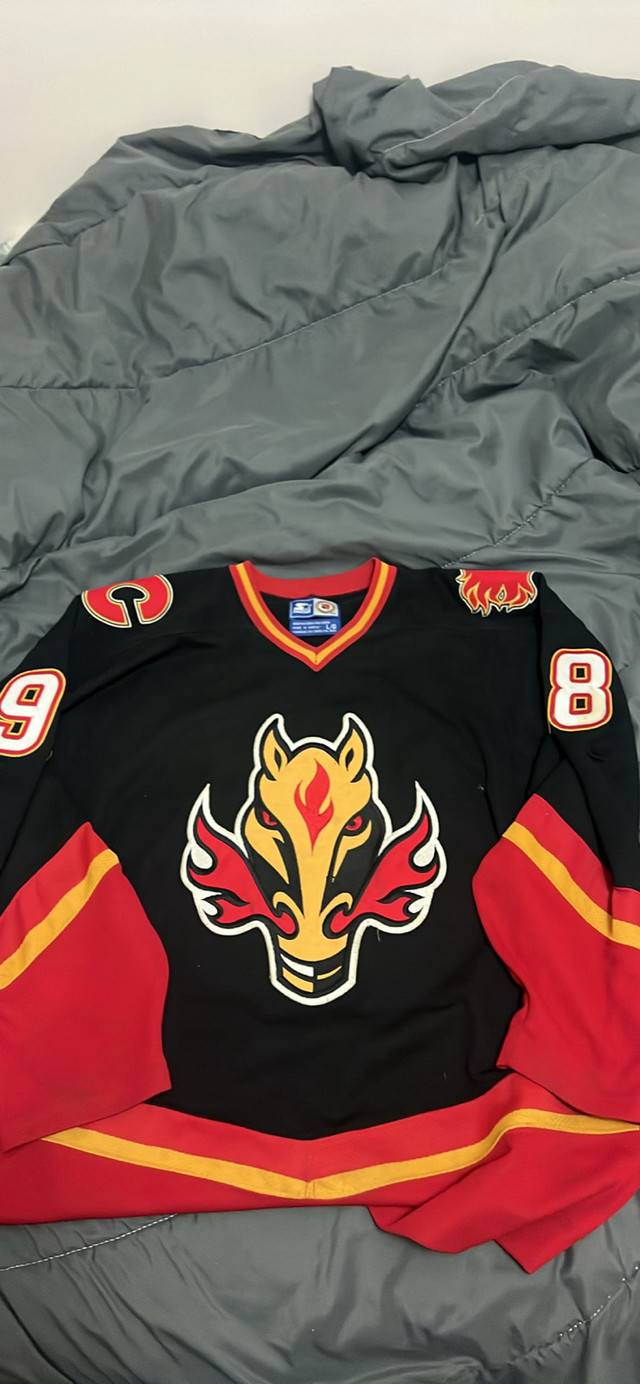 Autographed Calgary flames jersey  in Hockey in Brandon - Image 2