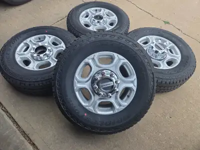 BRAND NEW Super Duty wheels and Bridgestone Dueler AT All Terrain tires. Fits 2005 through 2025 Mode...