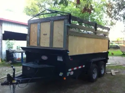 7000lb. Hydraulic dump trailer with wooden racks and canvas top. Very good condition. Oiled since ne...