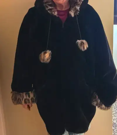 Luxurious black faux fur coat with cheetah print lined hood and sleeves/cuffs, made by The Princess...